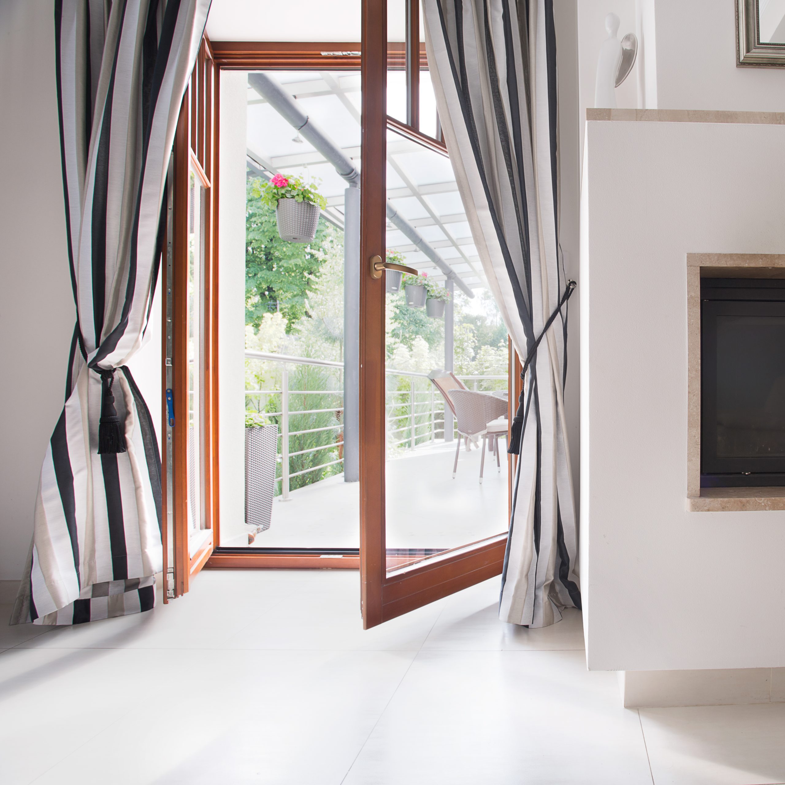 Open French doors leading onto a balcony